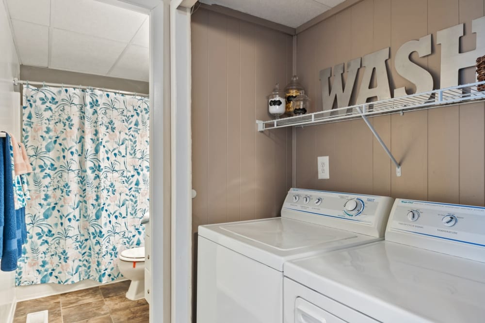 Laundry room and bathroom of apartment at Oxford Manor Apartments & Townhomes in Mechanicsburg, Pennsylvania