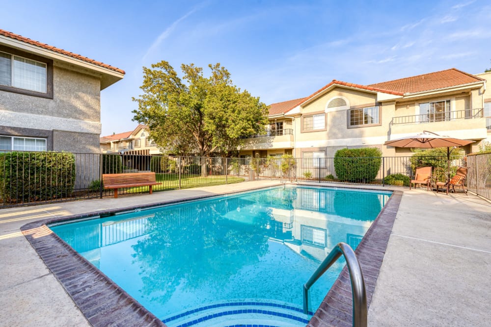 Outdoor inground pool at Pacifica Senior Living Fresno in Fresno, California
