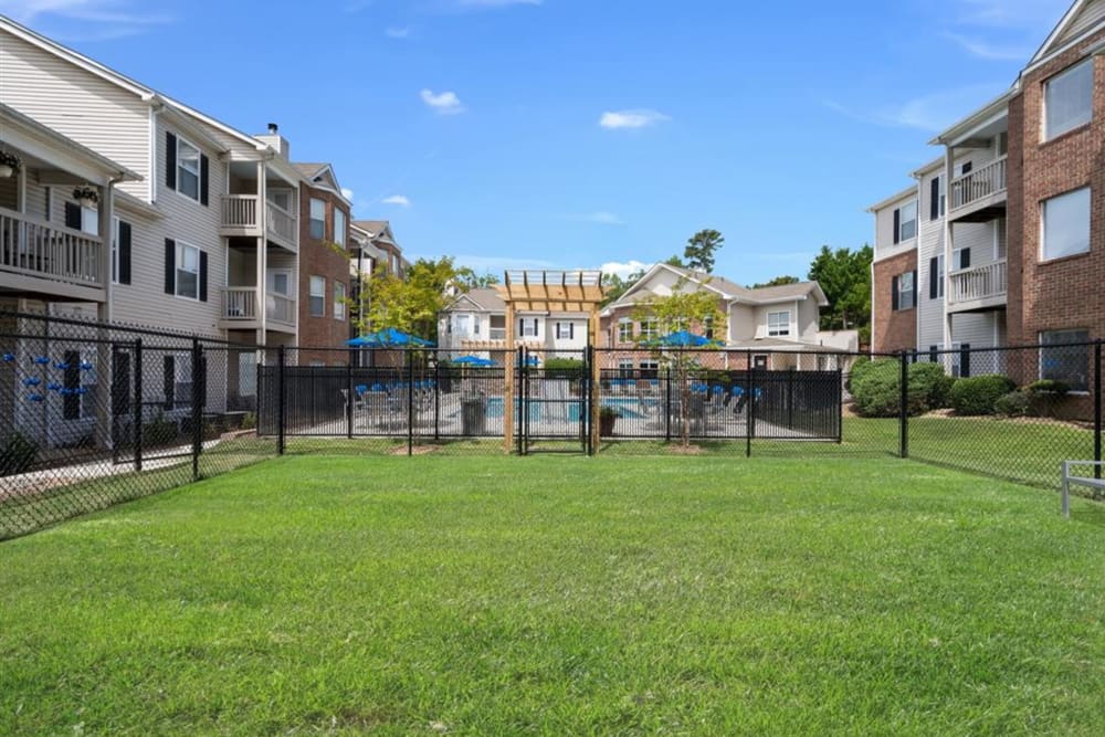 A fenced in dog park for residents at Chace Lake Villas in Birmingham, Alabama