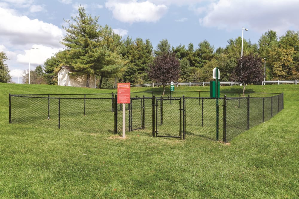 A gated outdoor dog park at Stonecreek Club in Germantown, Maryland