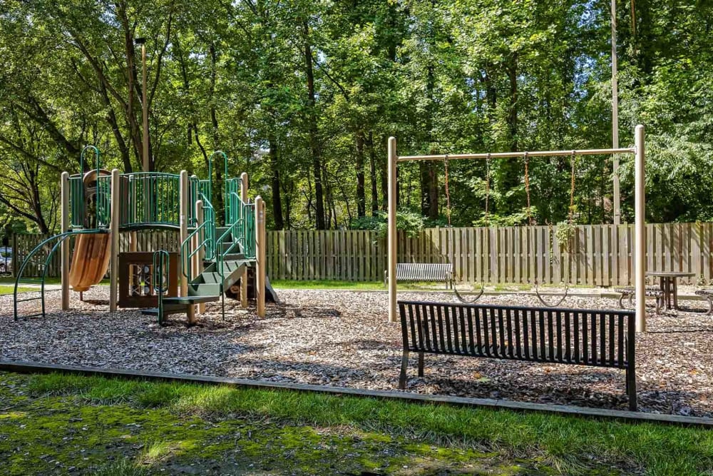 An onsite playground and benches at Hunt Club in Gaithersburg, Maryland