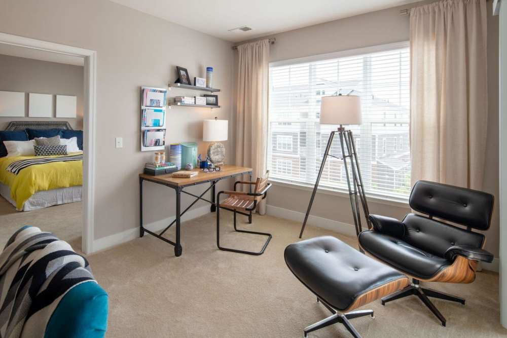 Living space with large windows at The Elms at Arcola in Dulles, Virginia