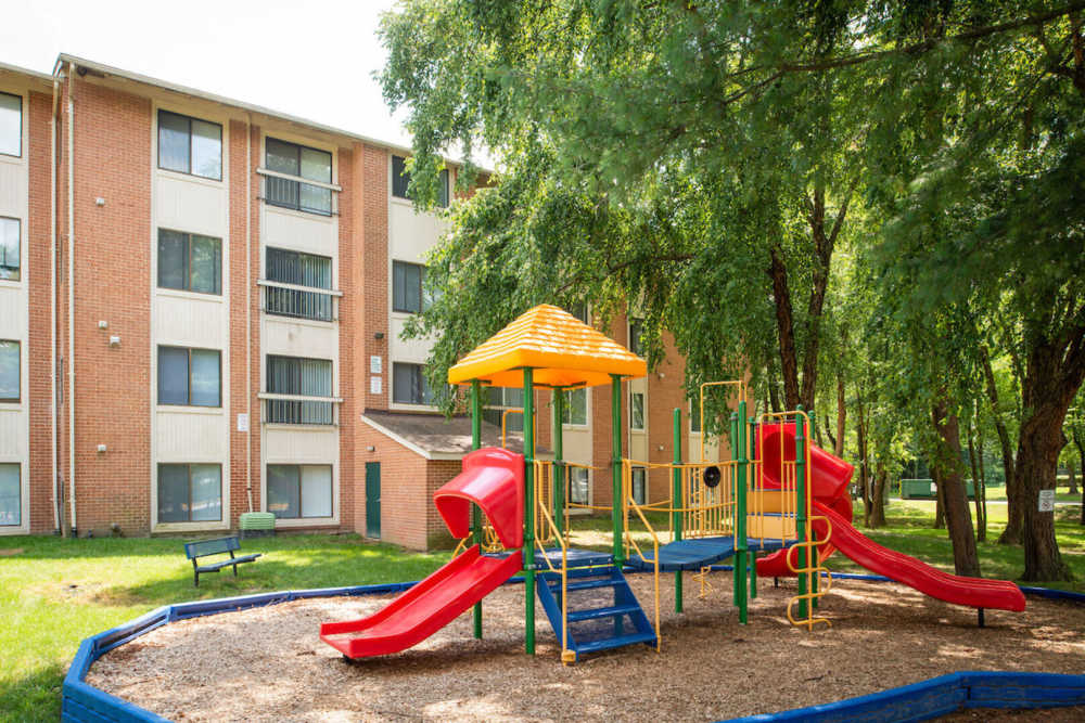 Kids play area with slides at The Elms at Old Mill in Millersville, Maryland