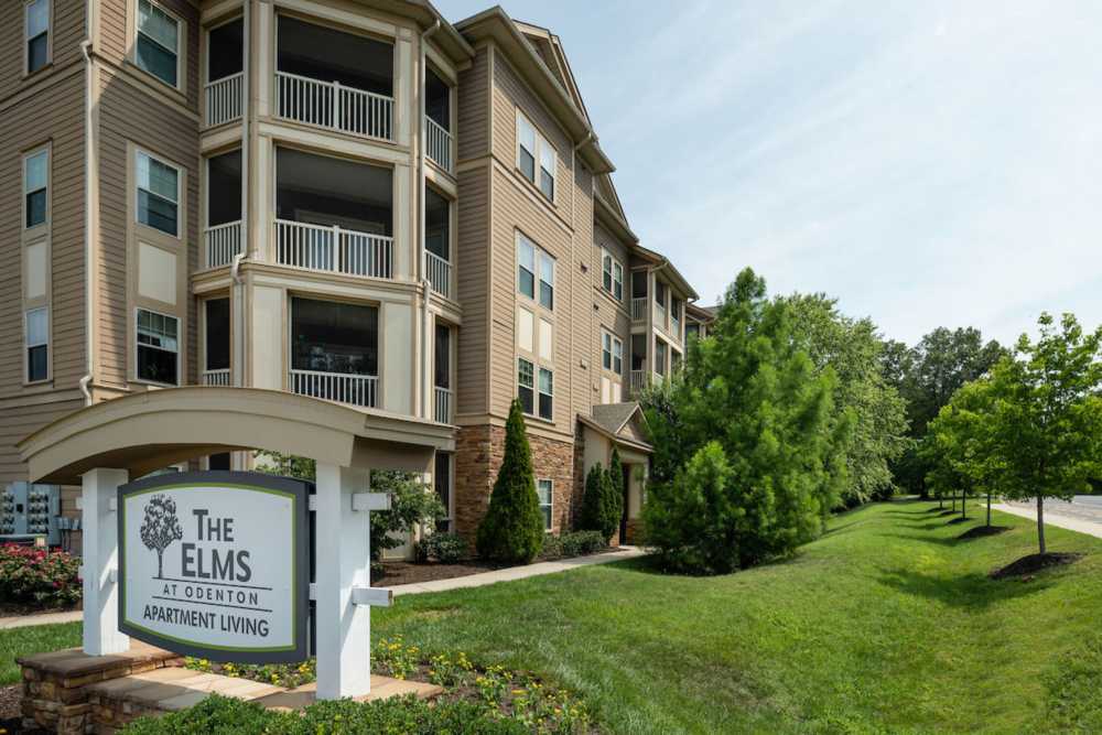Community building with signage board at The Elms at Odenton in Odenton, Maryland