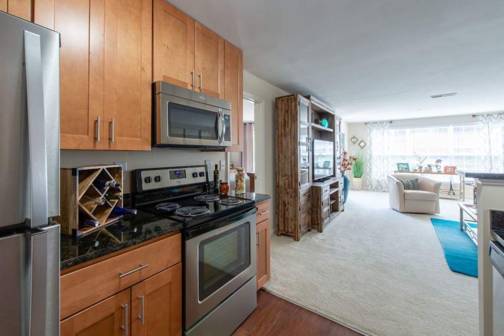 View of living room from the upgraded kitchen at The Elms at Centreville in Centreville, Virginia, 