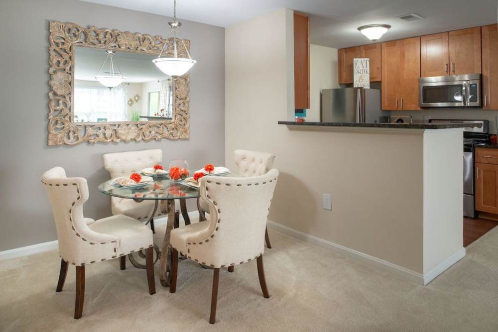 Separate dining room with view of kitchen at The Elms at Centreville in Centreville, Virginia, 
