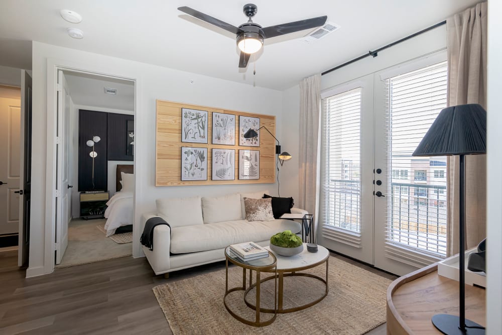 Beautiful White themed  living room at Auro Crossing in Austin, Texas