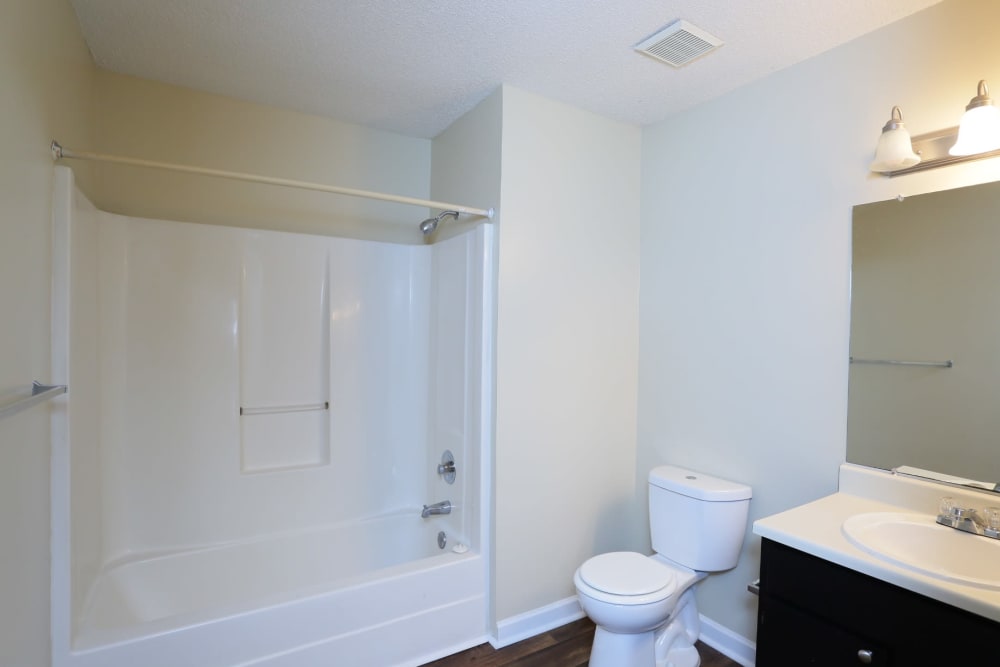 Bathroom with shower at Madison Pines Apartment Homes in Madison, Alabama
