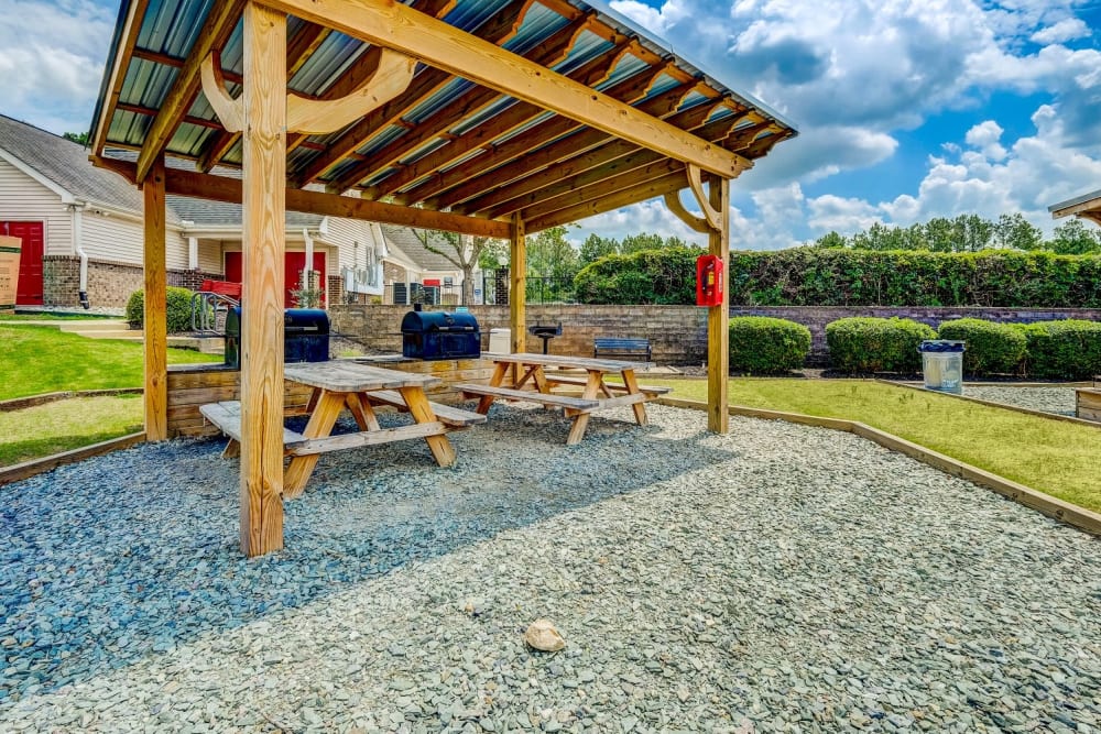 BBQ area with picnic tables at Chason Ridge Apartment Homes in Fayetteville, North Carolina