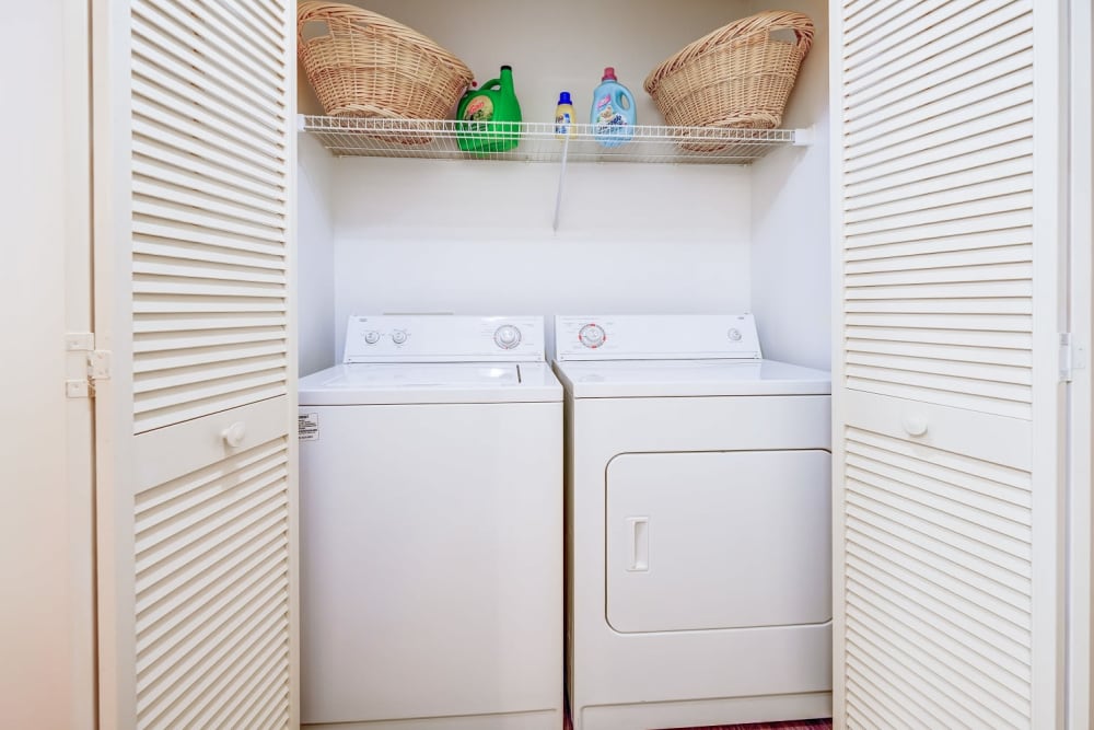 Washer and dryer in closet at Chason Ridge Apartment Homes in Fayetteville, North Carolina