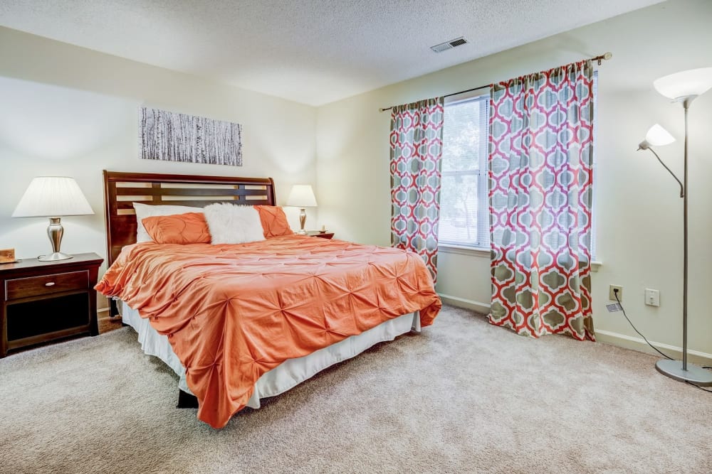 Spacious bedroom with large window at Chason Ridge Apartment Homes 