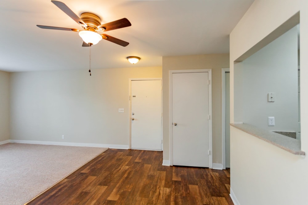 Living room with ceiling fan at Southwood Apartments in Nashville, Tennessee