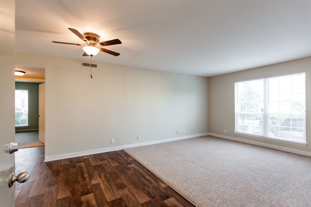 Living room with ceiling fan at Southwood Apartments in Nashville, Tennessee