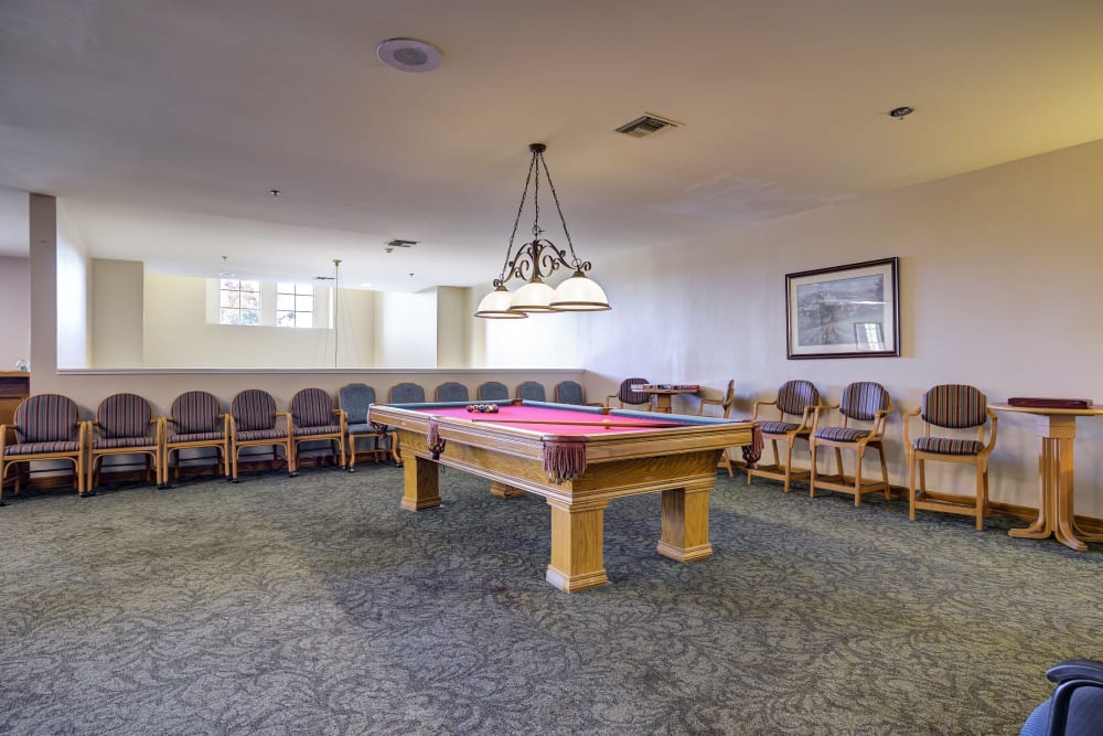 Game room with pool table at Pacifica Senior Living Bonita in Chula Vista, California