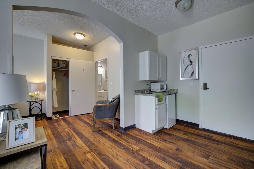 Resident living room with kitchenette at Pacifica Senior Living Bonita in Chula Vista, California