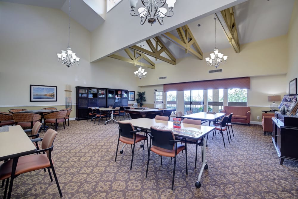 Recreation area with tables and chairs at Pacifica Senior Living Encinitas in Encinitas, California