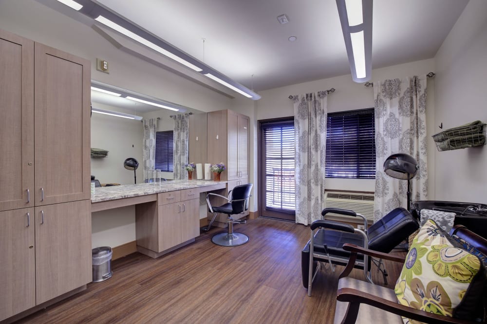 Hair salon with seating at Pacifica Senior Living Rancho Peñasquitos in San Diego, California