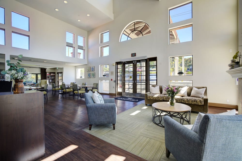 Main entrance with several chairs and a couch at Pacifica Senior Living Rancho Peñasquitos in San Diego, California