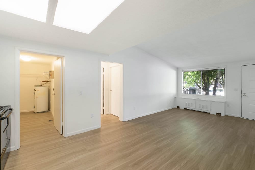 Living room with hardwood flooring at Lakeshore II Apartments in Fort Oglethorpe, Georgia