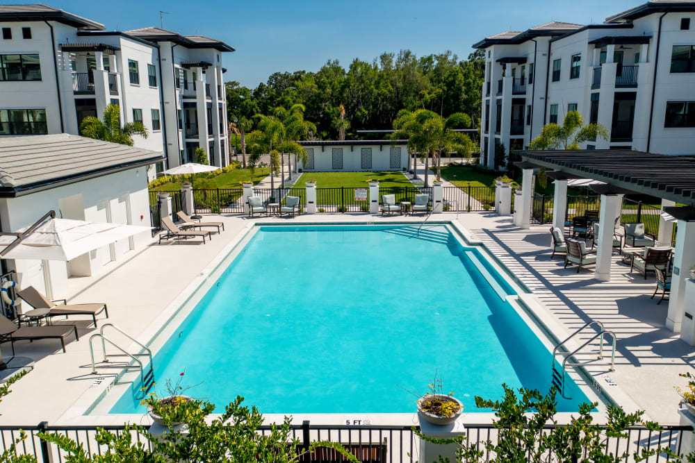 Outdoor pool area at Amira Choice Sarasota in Sarasota, Florida