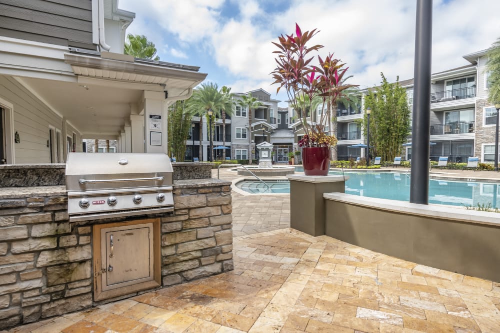 Inviting grilling patio near the pool at Bell at Universal in Orlando, Florida