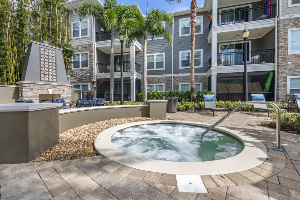 Inviting hot tub and outdoor space near Regatta at Universal Apartments in Orlando, Florida