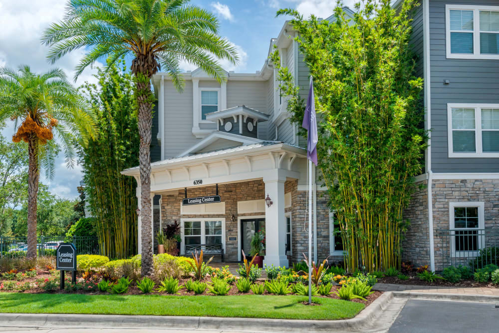 Exterior with palm trees Regatta at Universal Apartments in Orlando, Florida