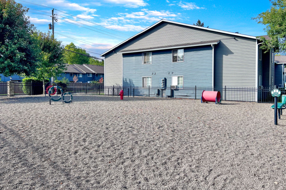 Have fun with your furry friend in the dog park at Walnut Grove Landing Apartments in Vancouver, Washington
