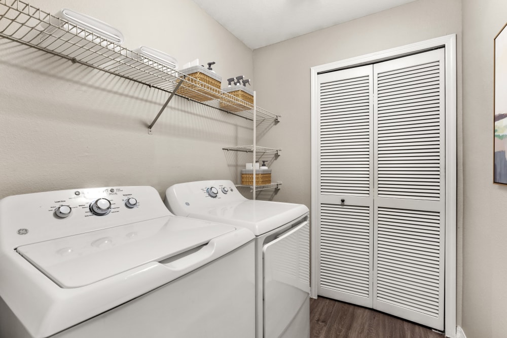 In-unit washer and dryer in a model apartment home at Cape House in Jacksonville, Florida