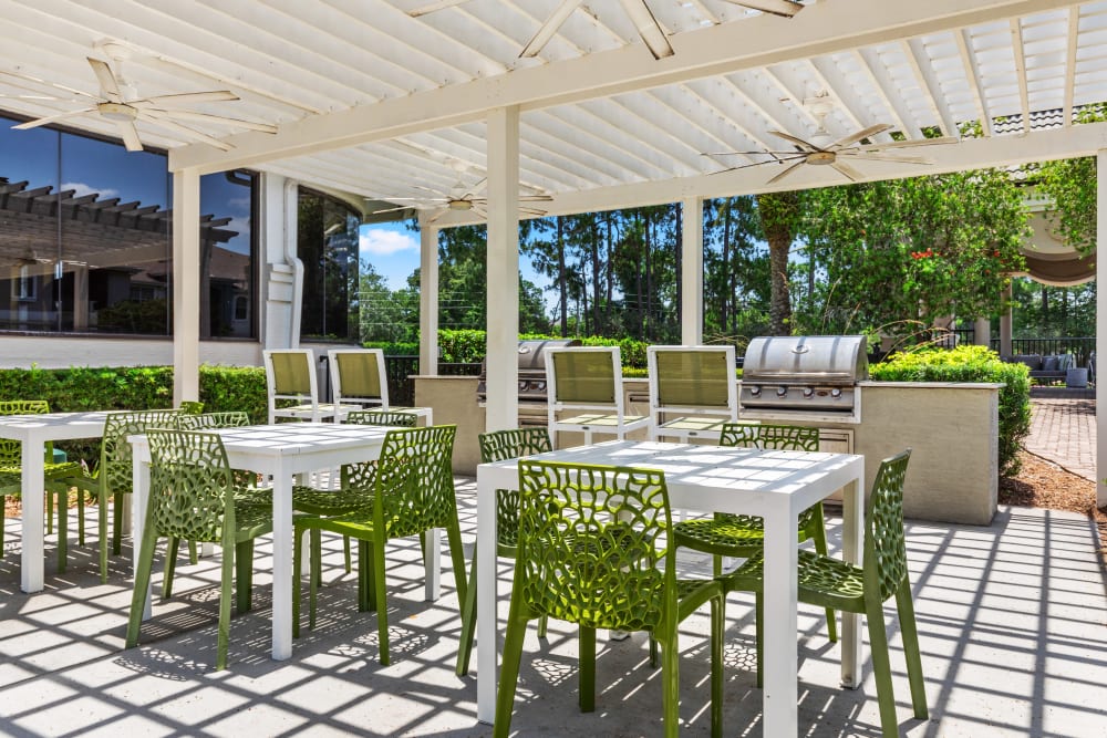 Pergola providing partial shade to the lounge chairs by the pool at Cape House in Jacksonville, Florida