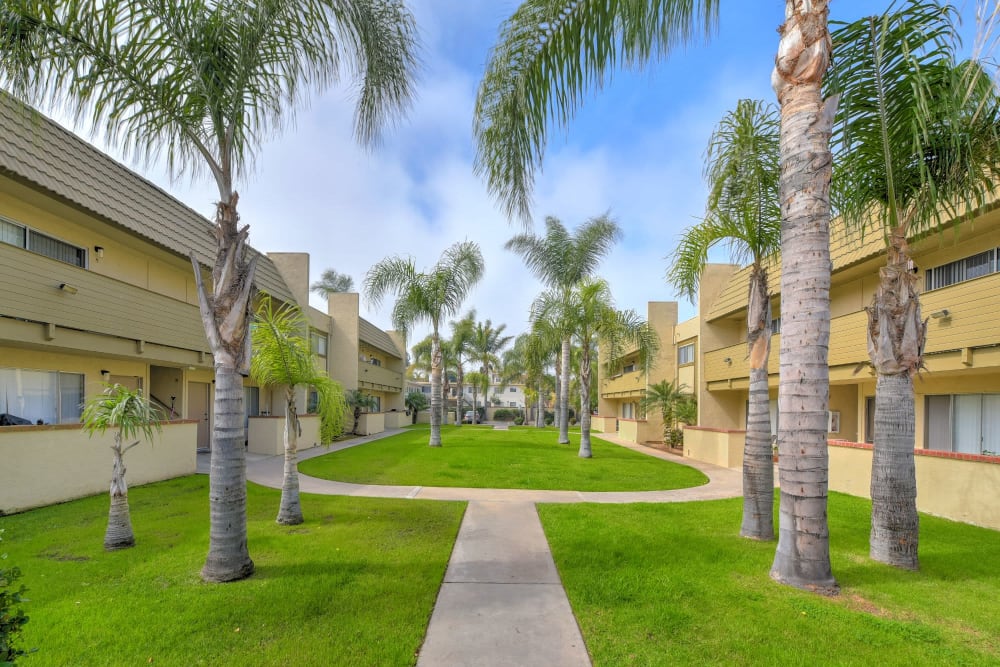 Well maintained walkway at Royal Village Apartments in San Diego, California
