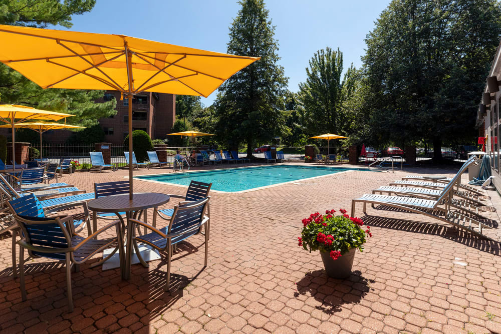 Swimming pool with beach umbrellas at Eagle Rock Apartments at Swampscott in Swampscott, Massachusetts