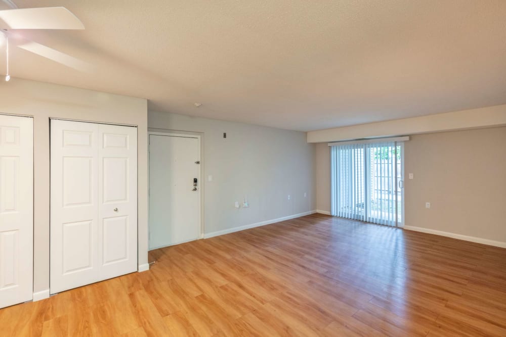 Open living room space to furnish at Bay Ridge at Nashua Apartments in Nashua, New Hampshire