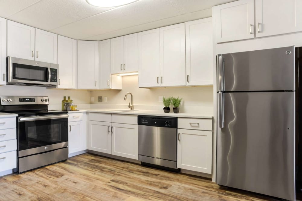Modern kitchen with stainless-steel appliances Bay Ridge at Nashua Apartments in Nashua, New Hampshire