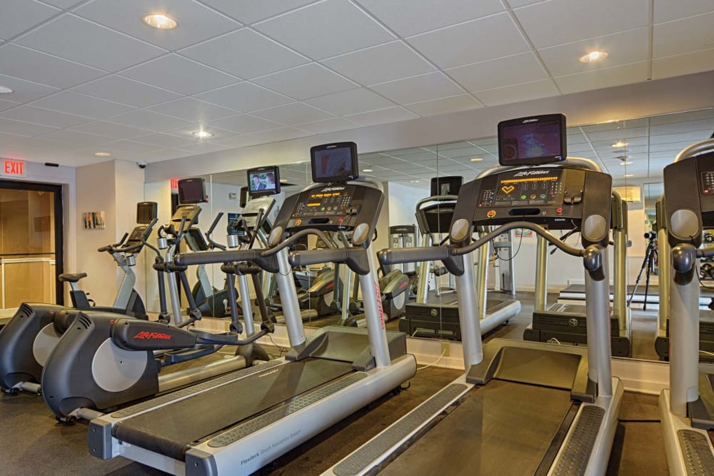 Fitness center with ample amounts of equipment at Eagle Rock Apartments at Framingham in Framingham, Massachusetts