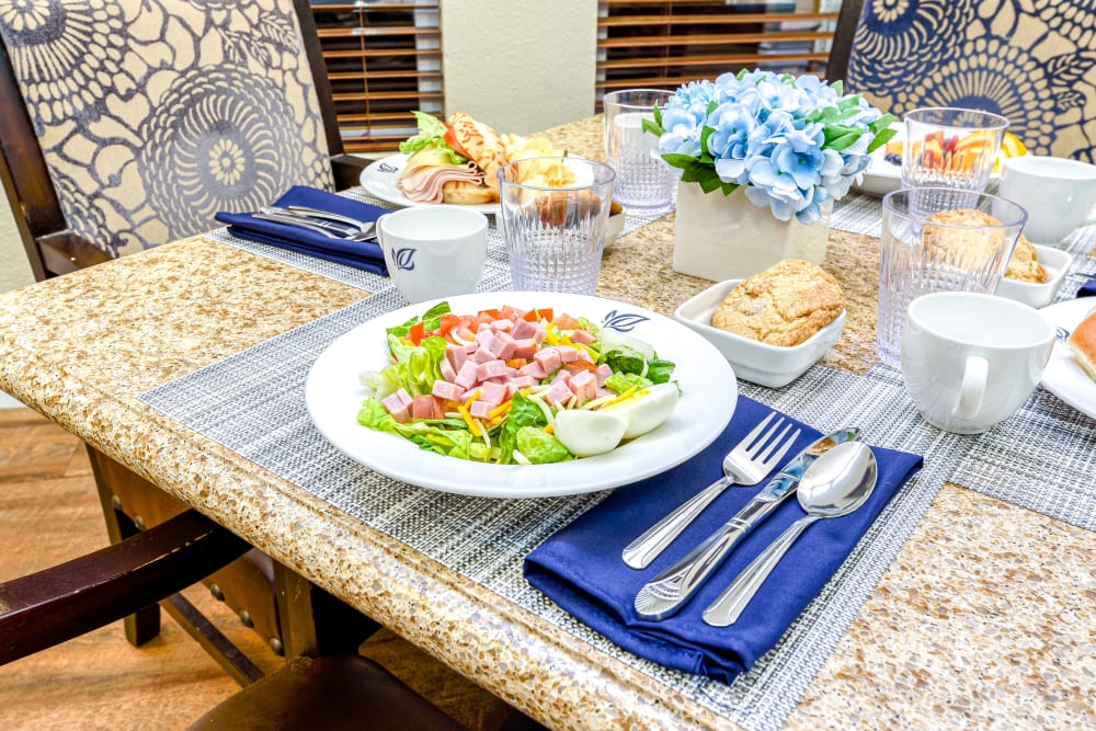 Dining area with table set up  at Pacifica Senior Living Green Valley in Henderson, Nevada