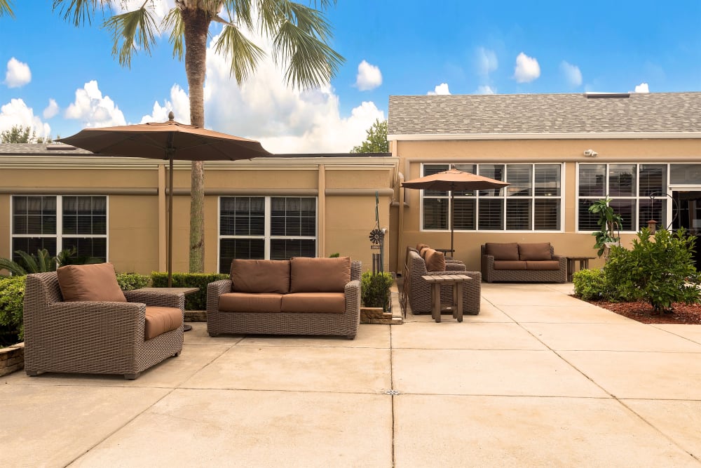 Couches near the garden area  at Pacifica Senior Living Ocala Senior Living Community
