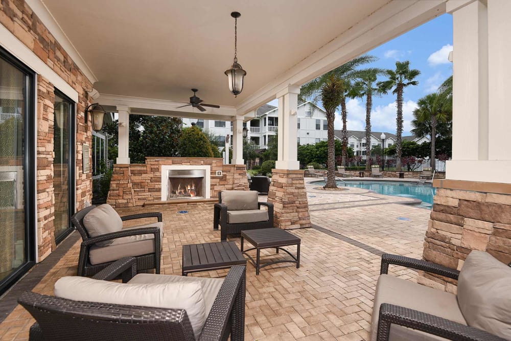Sitting area by the pool at Terraces at Town Center in Jacksonville, Florida