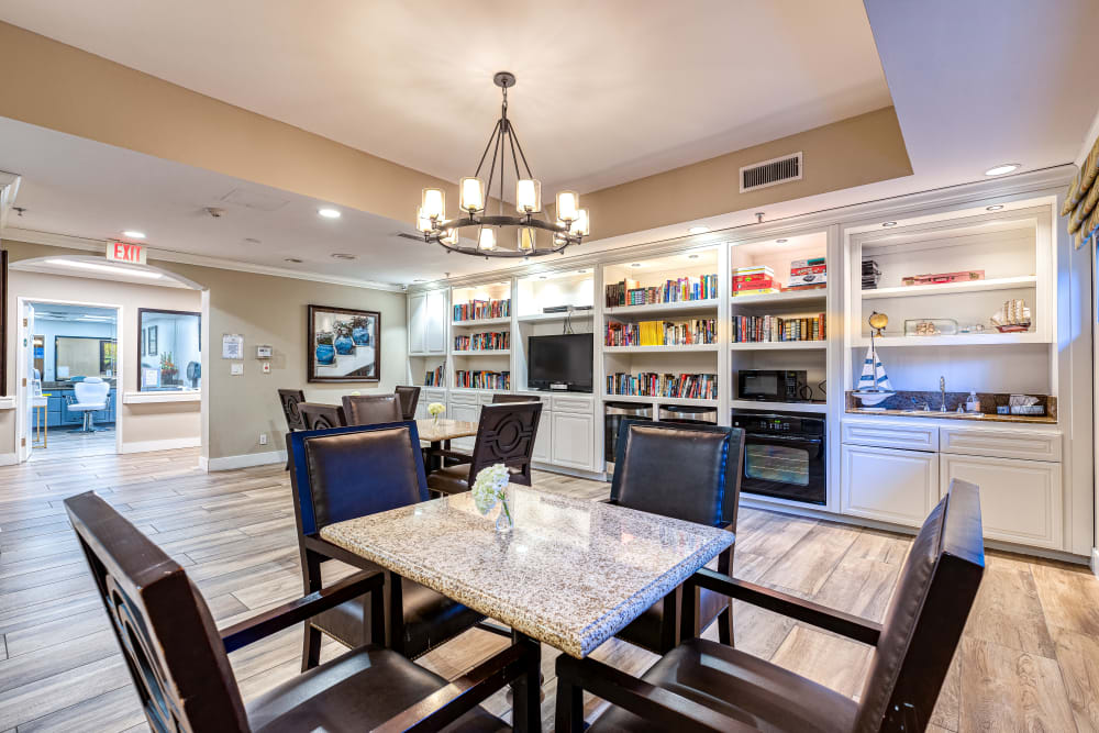 Enjoy a meeting area with book shelves at Pacifica Senior Living Santa Clarita Senior Living Community
