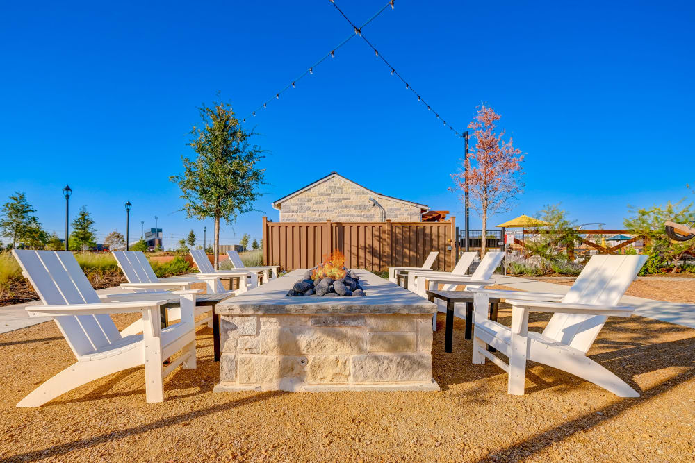 Comfortable space where residents can enjoy a fire pit and relax at BB Living Light Farms in Celina, Texas