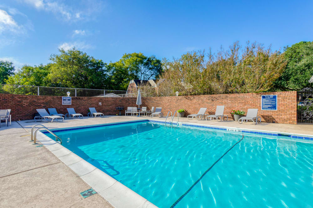 Resident enjoying the pool at The Gatsby at Midtown Apartment Living in Montgomery, Alabama