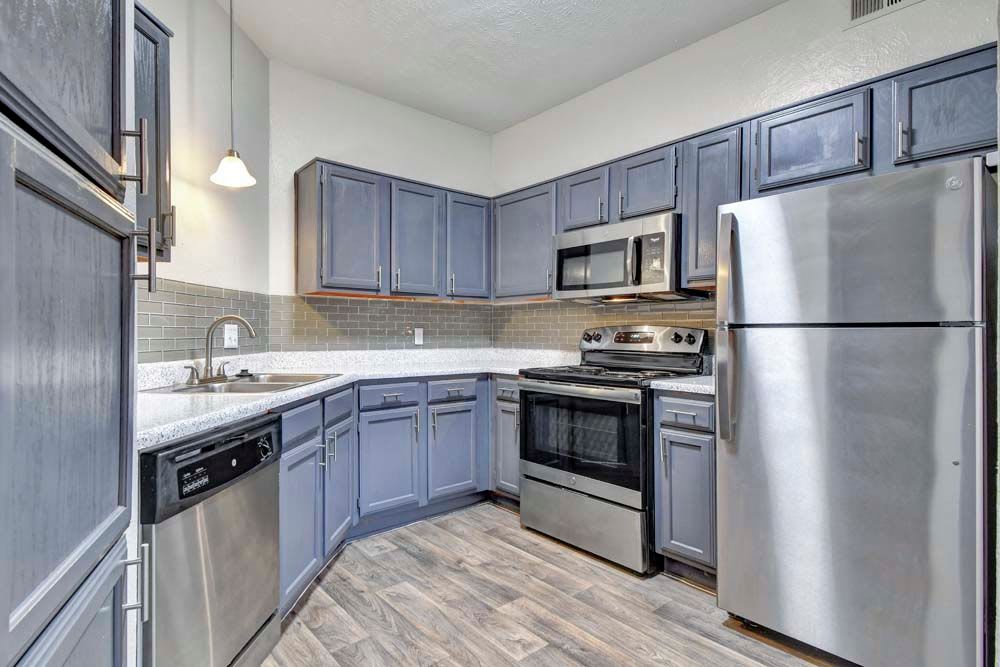 Kitchen with stainless steel appliances at {location_name}} in Duncanville, Texas