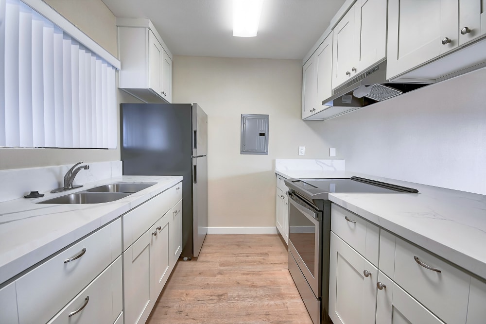 Apartment kitchen at Bay Breeze in Costa Mesa, California