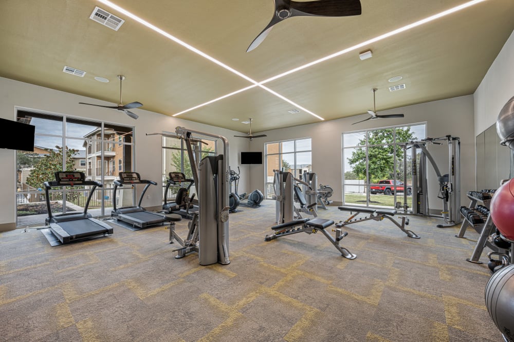 Gym equipment in the state of the art fitness center at The Residences at Panther Hollow in Marble Falls, Texas