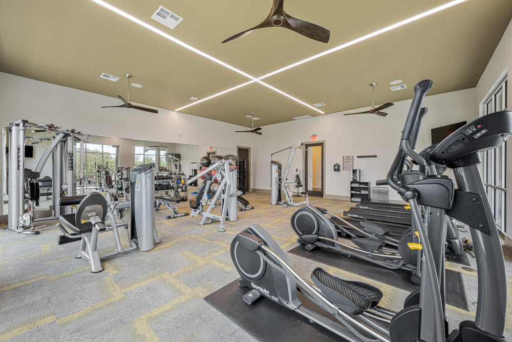 Well equipped fitness center at The Residences at Panther Hollow in Marble Falls, Texas