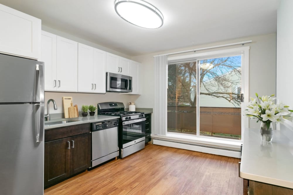 Kitchen with modern amenities at Eagle Rock Apartments & Townhomes at Brighton in Brighton, Massachusetts