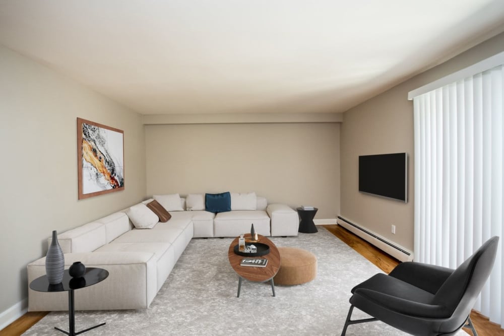 Modern living room at Eagle Rock Apartments & Townhomes at Brighton in Brighton, Massachusetts