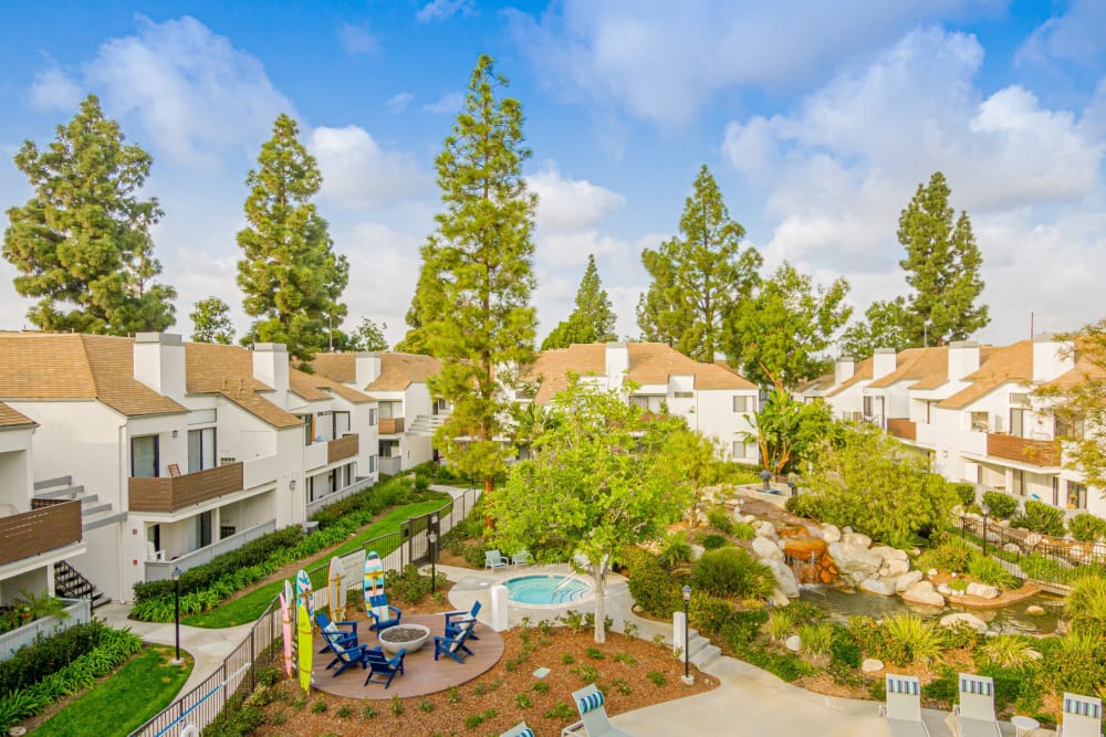 A wide-angle photo of the outdoor lounge and pool at Pleasanton Place Apartment Homes in Pleasanton, California