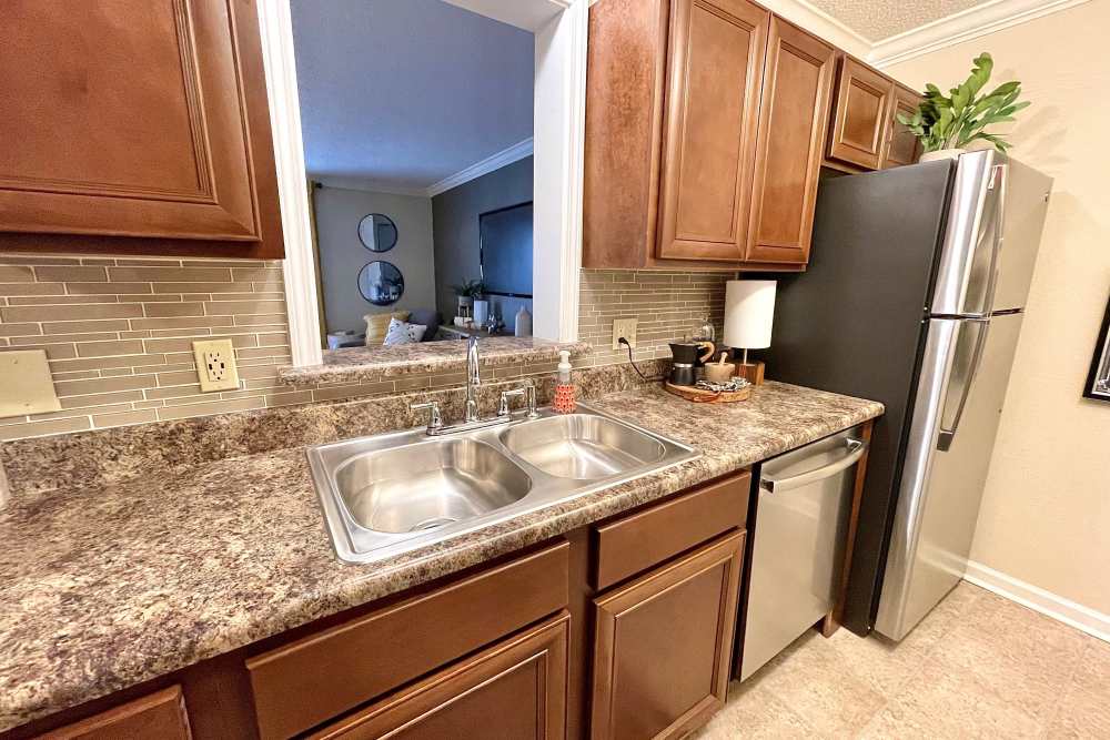 Spacious kitchen with fully equipped appliances at The Abbey at Riverchase in Hoover, Alabama
