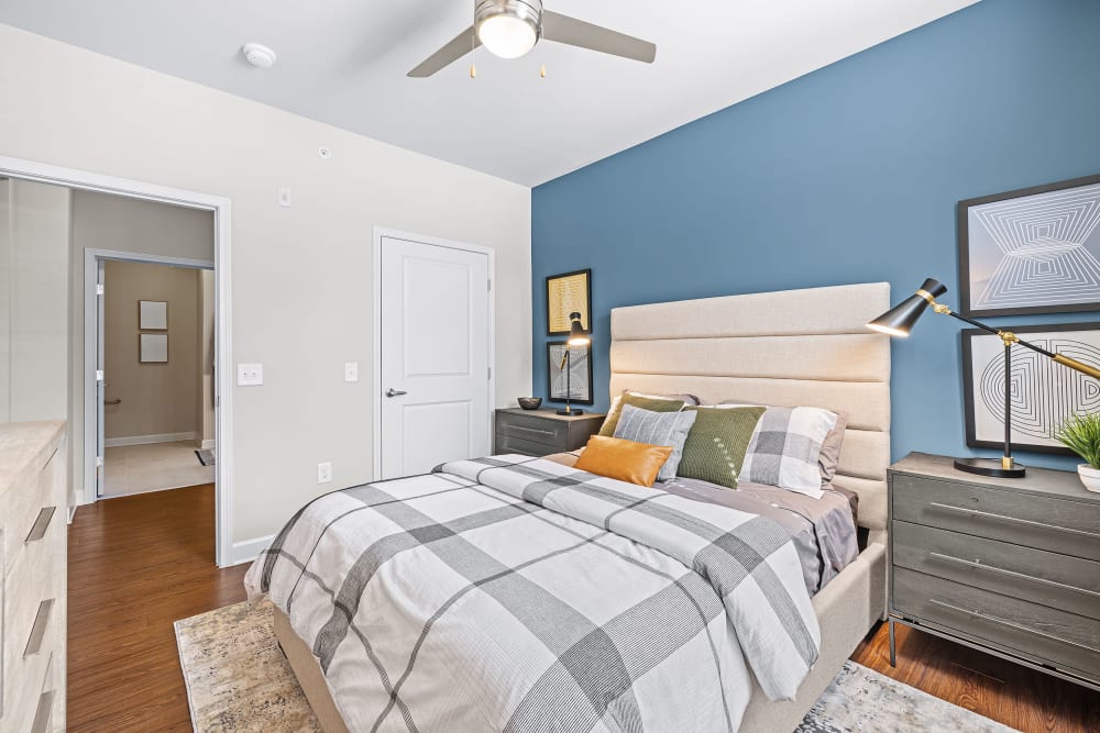 Bedroom with ceiling fan at Marquis at Morrison Plantation in Mooresville, North Carolina